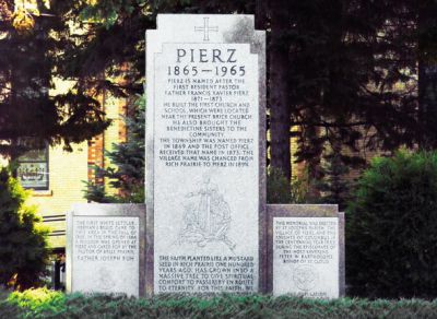 Apolonija Pirc je leta 1855 z družino odšla v Minnesoto, kjer je deloval njen brat misijonar Franc. Danes mestece Pierz, poimenovano po njem, šteje 1277 duš. Na sliki je spomenik ustanovitelju.